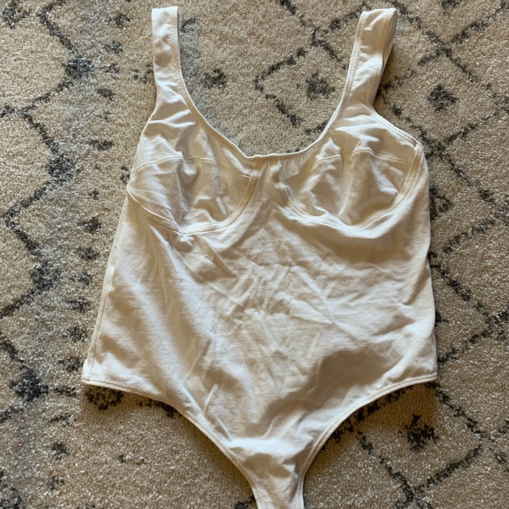 thong white body suit